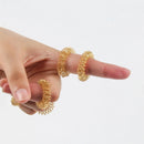Conjunto de anéis massageadores que aliviam o estresse